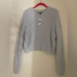 Woman’s: CropTop Light Blue Sweater Size:L